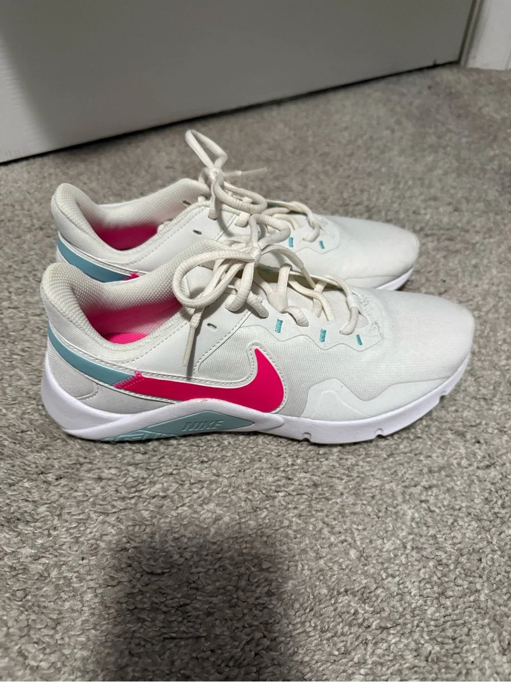 Nike White Sneakers with Pink Swoosh and Light Blue Accents
